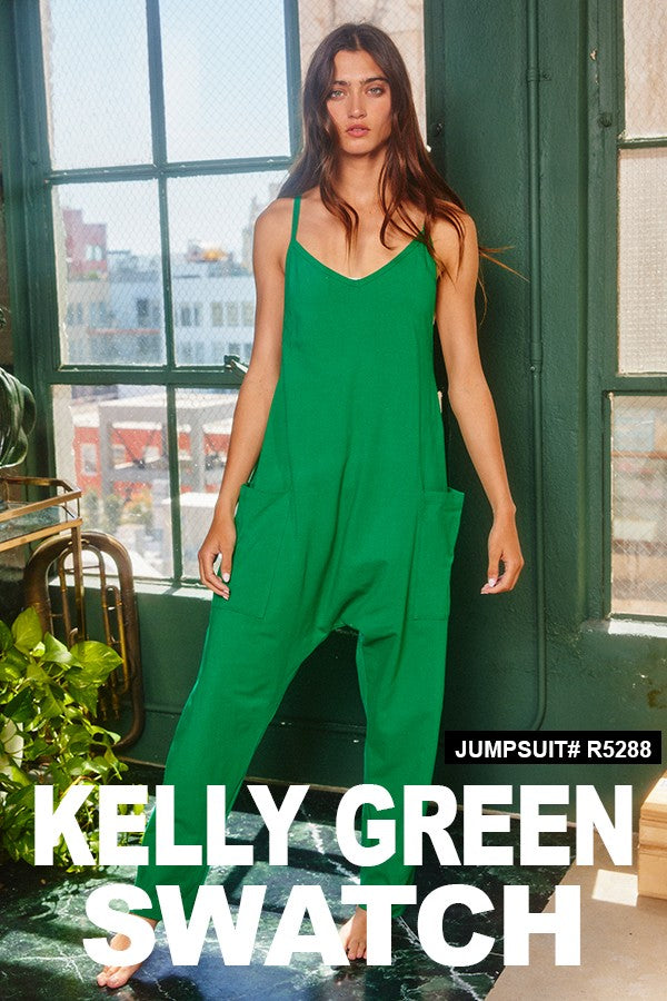 On The Go Jersey Dress Dress with built in romper V-Neck Sleeveless Racer back Side patched pockets Built-in romper for comfort & protection Zipper Pockets 95% Cotton, 5% Spandex Color: Heather Grey and Kelly Green This stylish On The Go Jersey Dress features a built-in romper perfect for busy days out and about. Built to move with you, its lightweight fabric and built-in shorts provide all-day comfort and support. Enjoy the convenience of an effortless one-piece look without compromising style.