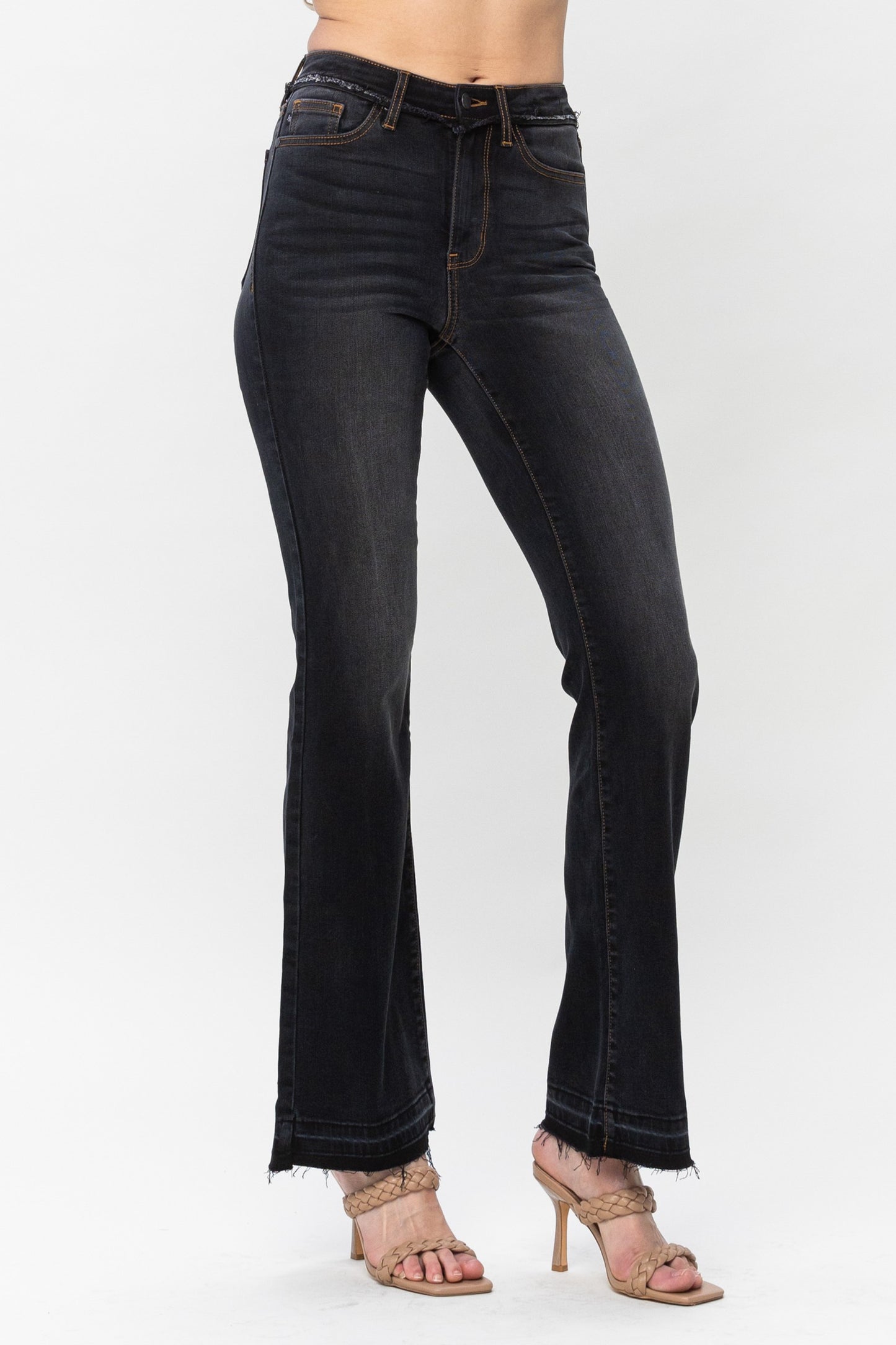 Black High Waist Release Hem Slim Bootcut - Judy Blue Slim Boot Cut Release Hem High Waist FRONT RISE: 10.63" INSEAM: 32" 65% Cotton, 21%Rayon, 11% Poly, 3% Spandex Color: Black The Black High Waist Release Hem Slim Bootcut by Judy Blue is perfect for a day out. These stylish boot cut jeans feature a modern slim fit, high waist and flattering release hem. Get ready to look your best anytime, anywhere.