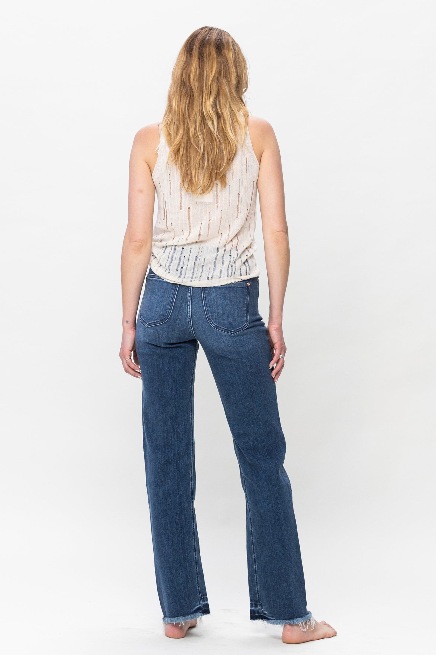 High Waist Inseam Detail & Release Hem Straight - Judy Blue Straight leg jean Inseam Detail High Waist FRONT RISE: 11" INSEAM :32" 93% Cotton, 6% Poly, 1% Spandex Color: Blue These jeans from Judy Blue feature a high waist and inseam detail. The distressed bottoms offer a stylish look and the comfortable fit will make them your go-to for any event. With these jeans, you'll look fashionable and feel confident. Perfect amount of stretch and comfort.