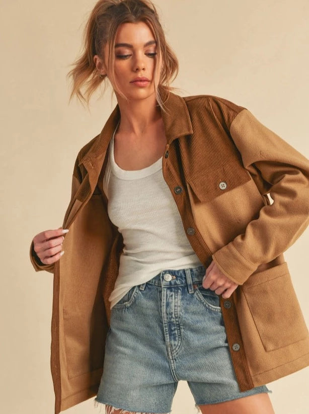 Emilia Jacket Two toned jacket Button Up Pocket Details 100% Polyester Color: Multiple The contrast fabric design of Emilia Jacket is very eye-catching, featuring a relaxed silhouette with dropped shoulder perfect for layering.