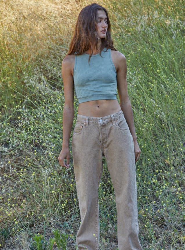 Headstart Brami Seamless Brami Waffle Texture Crop Tank Top 92% Nylon, 8% Spandex Color: Light Moss This Headstart Brami is a casually stylish top with a unique waffle texture. Perfect for a range of occasions, this top features a comfortable fit, breathable fabric and subtle detailing. Enjoy a hassle-free look with this contemporary piece.