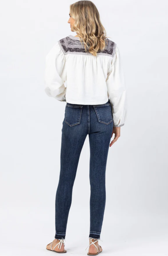 High Waist Tummy Control Skinny Jeans - Judy Blue Skinny Jeans Release Hem High Waist Tummy Control Panel Size down 1 size FRONT RISE: 10.75" INSEAM: 28.5" 93% Cotton, 6% Polyester, 1% Spandex Color: Blue These High Waist Tummy Control Skinny Jeans from Judy Blue will help you look slimmer and smoother without sacrificing comfort. Crafted with a special tummy control panel, they offer superior support and a flattering fit. With these jeans, you'll feel comfortable while looking your best.