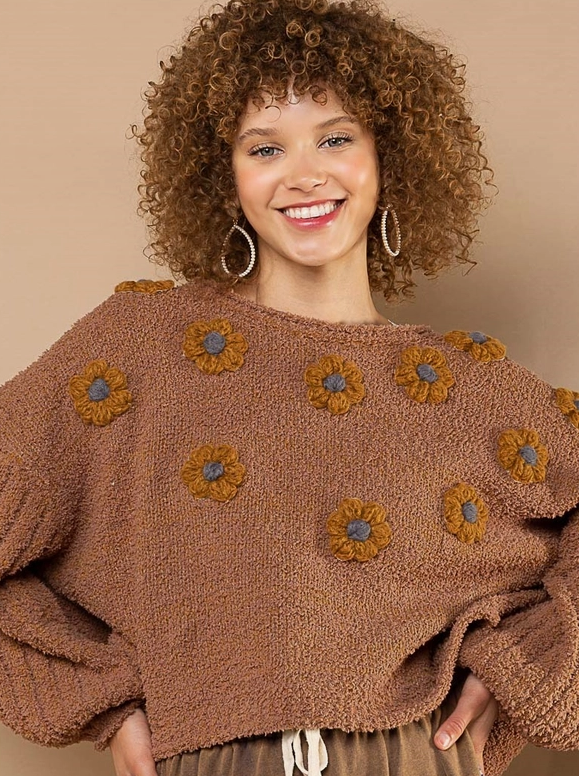 Teddy Floral Fleece Sweater Designed in round neck Balloon sleeves Relaxed fit Embellished floral patch pattern Berber fleece pullover sweater Specs/dimensions: - Bust: 27-1/2" - Length: 21" - Shoulder: 25-1/2" - Sleeve length: 17" 100% Polyester Color: Mocha