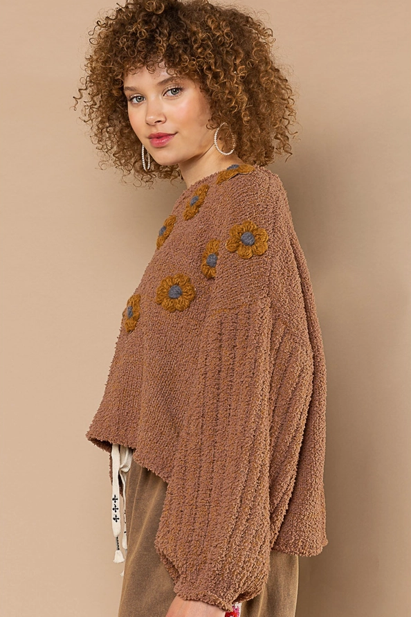 Teddy Floral Fleece Sweater Designed in round neck Balloon sleeves Relaxed fit Embellished floral patch pattern Berber fleece pullover sweater Specs/dimensions: - Bust: 27-1/2" - Length: 21" - Shoulder: 25-1/2" - Sleeve length: 17" 100% Polyester Color: Mocha