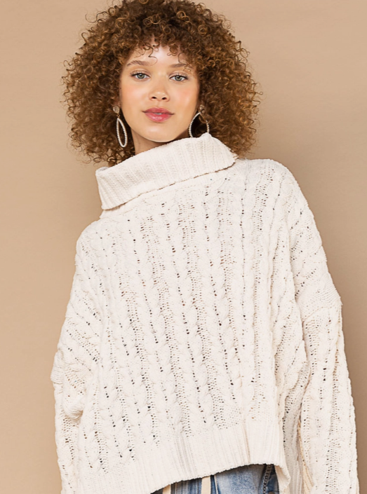 Turtle Neck Cable Knit Sweater Designed in an oversize body Turtle neck long sleeve in chenille with cable knitting Pullover sweater Specs/dimensions: - Bust: 30" - Length: 20-1/2" - Sleeve: 17-1/2" - Shoulder: 29-1/2" 100% Polyester Color: Powder Cream