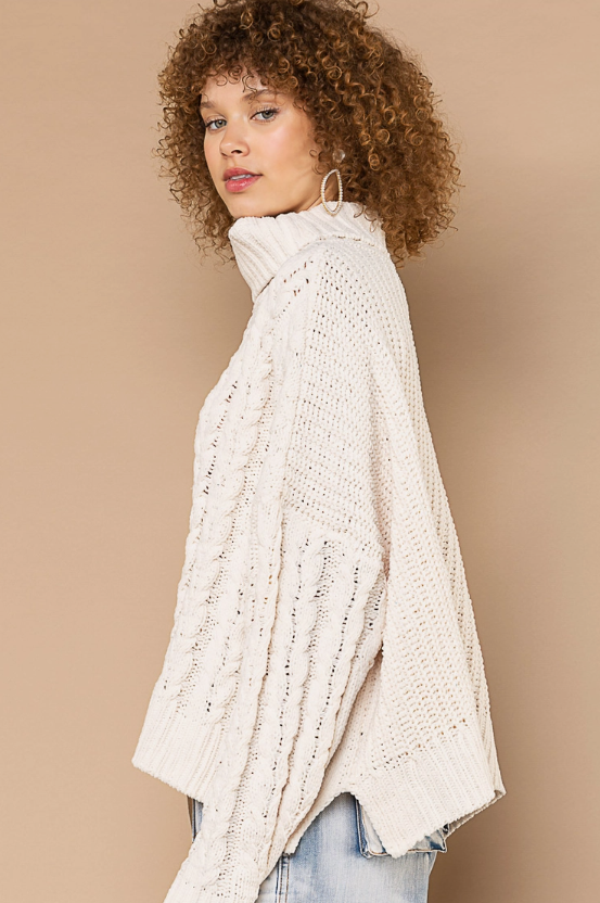 Turtle Neck Cable Knit Sweater Designed in an oversize body Turtle neck long sleeve in chenille with cable knitting Pullover sweater Specs/dimensions: - Bust: 30" - Length: 20-1/2" - Sleeve: 17-1/2" - Shoulder: 29-1/2" 100% Polyester Color: Powder Cream