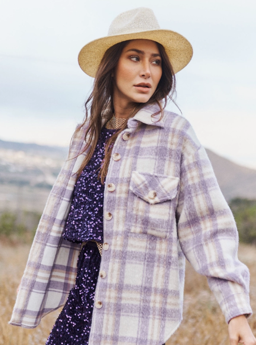 Lilly Lilac Plaid Shacket Plaid Design Button Down Shacket Collar 100% Polyester Color: Lilac This Lilly Lilac Plaid Shacket is a fashionable option for the cooler seasons. Combining the warmth of a jacket and the versatility of a shirt, it is an ideal addition to any wardrobe. Crafted from plaid fabric, this shacket provides a stylish and cozy look.