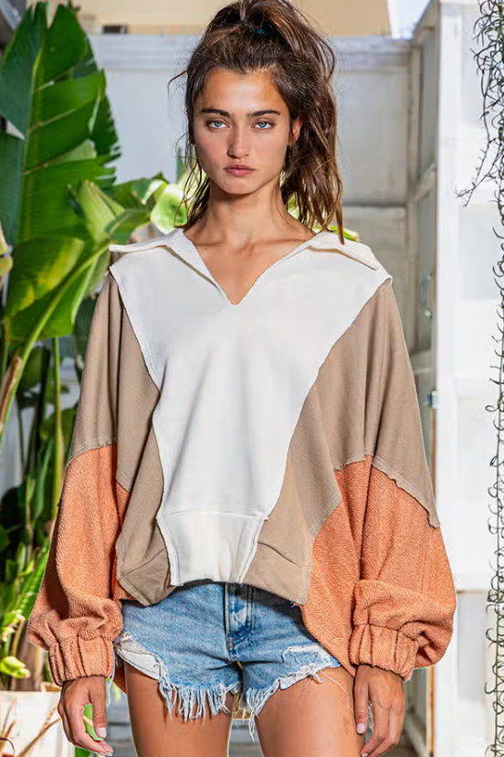 Outbound Oversized Contrast Top Oversized Spread Collared V-Neck Contrast Top French-terry cotton fabric Spread collared V-neckline Contrast raw edge detail Elastic cuffs Oversized fit 74% Cotton, 26% Polyester Color: Cream/Taupe/Salmon
