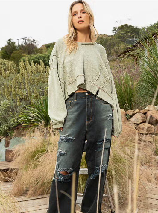 Relaxed Hooded Knit Top Designed in round neck Relaxed fit Balloon sleeves Hoodie knit top in cut and sew knit with out seam & top stitch details
