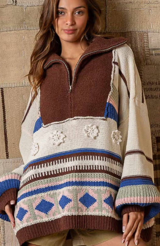 Jade Half Zip Sweater Designed in half zipper front High collar Balloon long sleeves Oversized fit Outseam edge and patch details Ethnic patterned color block Chenille pullover sweater Specs/Dimensions: - BUST: 27" - LENGTH: 24-1/2" - SLEEVE: 15-3/4" - SHOULDER: 25" 100% Polyester Color: Cream Multi This Jade Half Zip Sweater has a vintage design with a half zip closure. The sweater is made from a soft, lightweight fabric for ultimate comfort and warmth. Perfect for your active lifestyle.