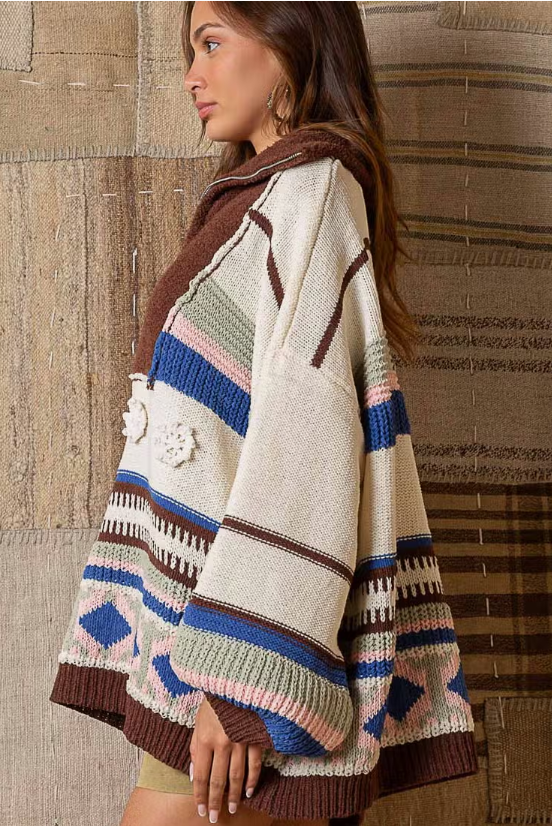Jade Half Zip Sweater Designed in half zipper front High collar Balloon long sleeves Oversized fit Outseam edge and patch details Ethnic patterned color block Chenille pullover sweater Specs/Dimensions: - BUST: 27" - LENGTH: 24-1/2" - SLEEVE: 15-3/4" - SHOULDER: 25" 100% Polyester Color: Cream Multi This Jade Half Zip Sweater has a vintage design with a half zip closure. The sweater is made from a soft, lightweight fabric for ultimate comfort and warmth. Perfect for your active lifestyle.
