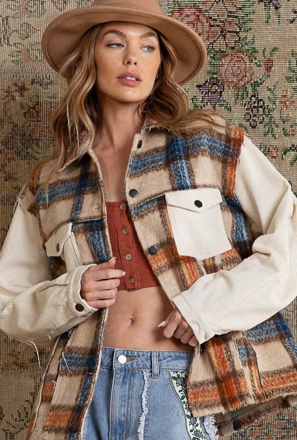 Style meets function in the Parker Plaid Contrast Jacket. This unique plaid button down jacket is designed with your comfort in mind. It's made from lightweight, breathable fabric that keeps you warm while allowing you to move freely. It's also equipped with two flap pockets, perfect for storing small items like your phone or wallet. Stay fashionable and comfortable in the Parker Plaid Contrast Jacket.