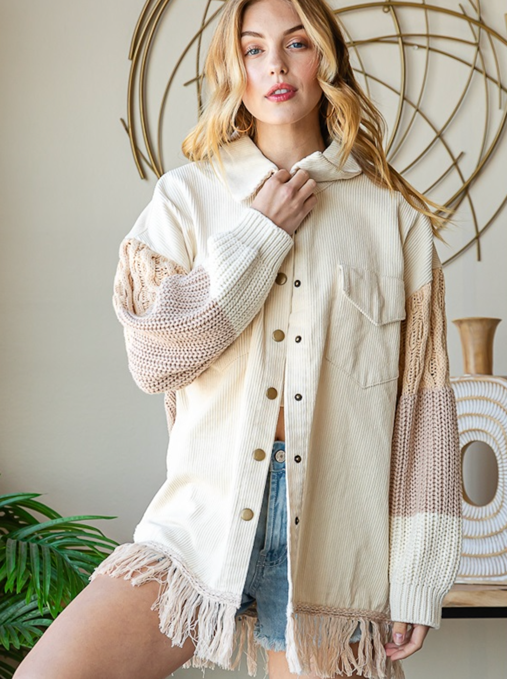 Colorado Corduroy Sweater Jacket Corduroy Jacket Sweater Back Mixed Plaid Relaxed fit 100% Cotton Color: Cream This Colorado Corduroy Sweater Jacket will keep you warm and stylish with its combination of classic corduroy fabric and sweater lining. Perfect for a chilly day, this jacket features comfortable cotton corduroy and a cozy, knit back. Get ready for winter with this timeless piece.