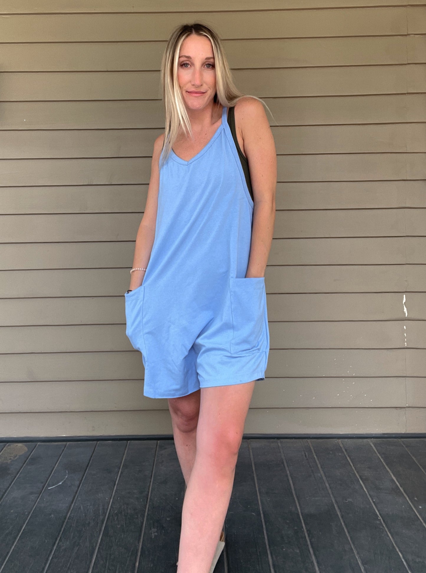Cozy Up Tank Romper - Blue Oversize Tank V-neck Solid Jersey Romper Effortless and oversized silhouette Racerback Oversized patch pockets Dropped armholes Soft and comfy onesie features a slouchy 95% Cotton, 5% Spandex Color: Blue