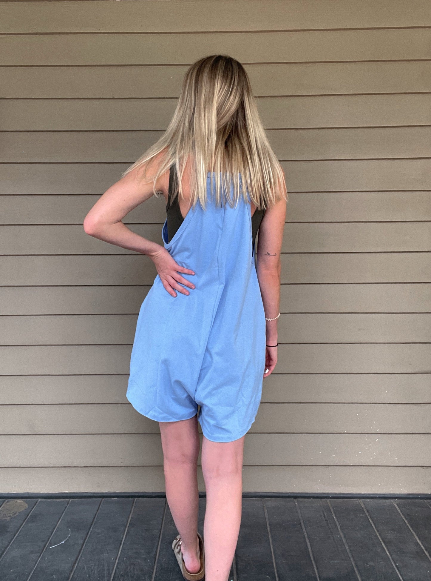 Cozy Up Tank Romper - Blue Oversize Tank V-neck Solid Jersey Romper Effortless and oversized silhouette Racerback Oversized patch pockets Dropped armholes Soft and comfy onesie features a slouchy 95% Cotton, 5% Spandex Color: Blue