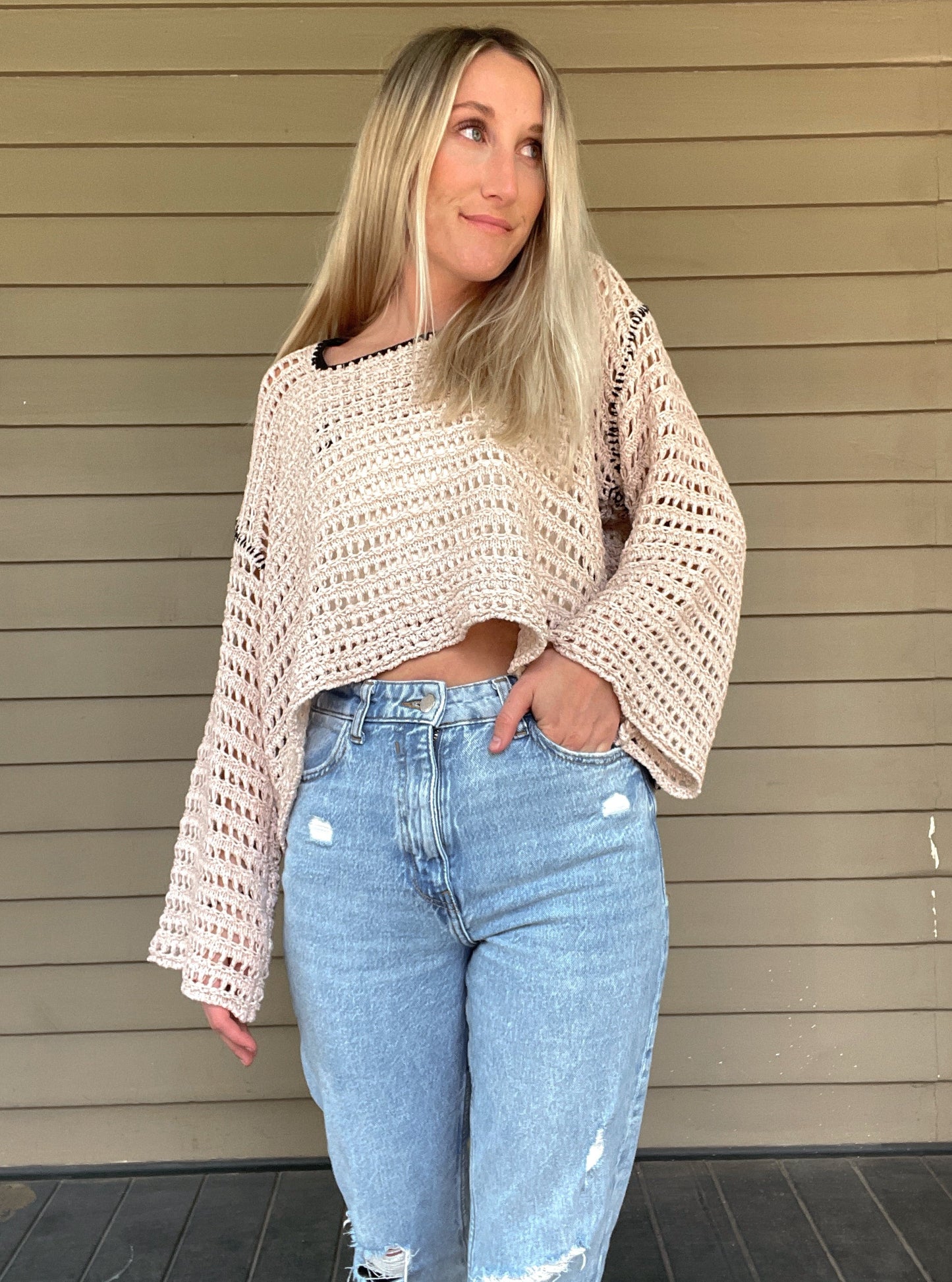 True Romance Open Knit Sweater - Taupe Open Knit Sweater Tie Back Crochet Top 53% Acrylic, 47% Nylon Color: Taupe Look stylish and feel relaxed with this taupe True Romance Open Knit Sweater. Crafted with a delicate crochet top, this sweater is the perfect piece to keep you comfortable and fashionable. The classic design makes it easy to pair with any outfit for a stunning look.