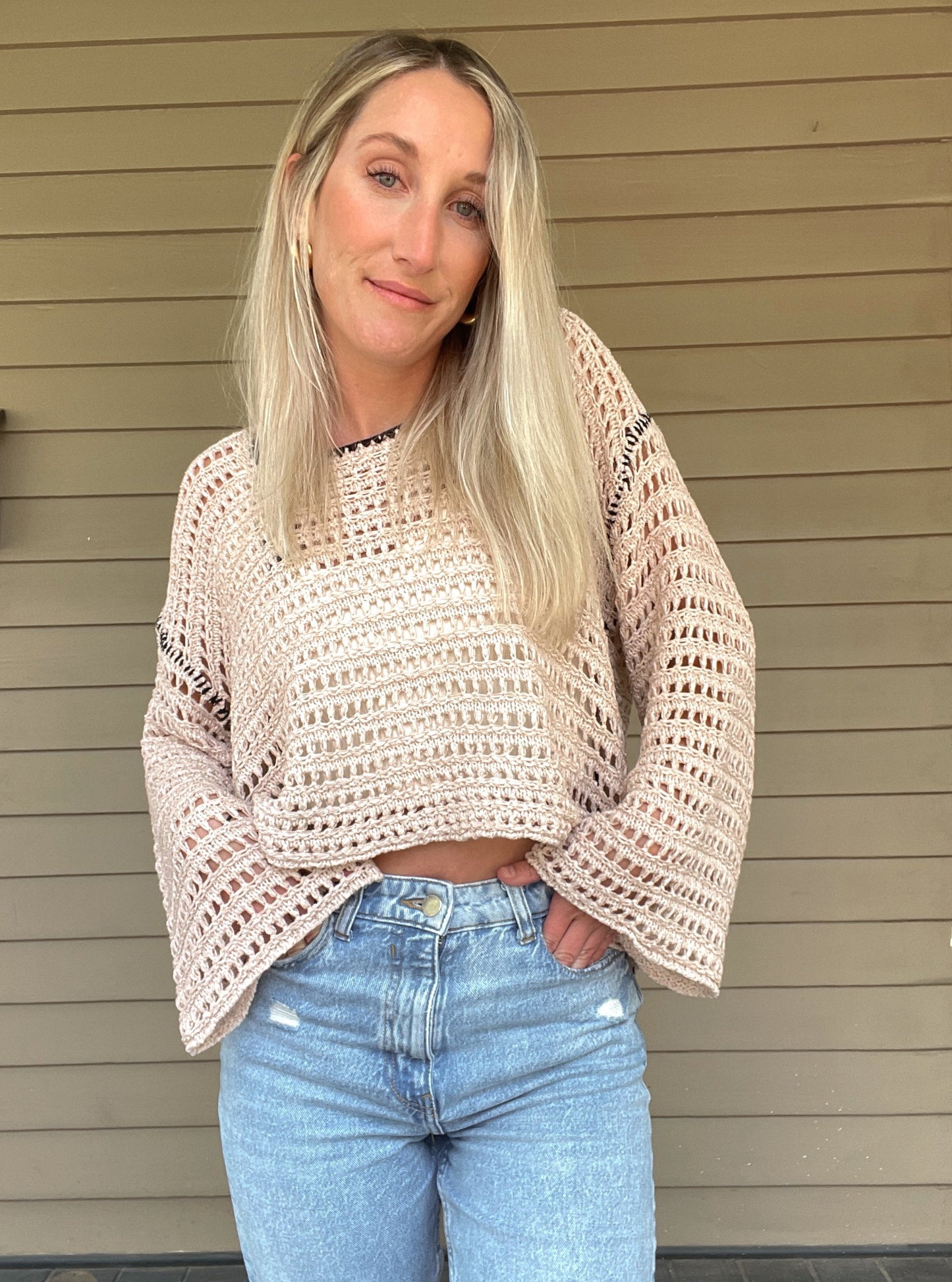 True Romance Open Knit Sweater - Taupe Open Knit Sweater Tie Back Crochet Top 53% Acrylic, 47% Nylon Color: Taupe Look stylish and feel relaxed with this taupe True Romance Open Knit Sweater. Crafted with a delicate crochet top, this sweater is the perfect piece to keep you comfortable and fashionable. The classic design makes it easy to pair with any outfit for a stunning look.