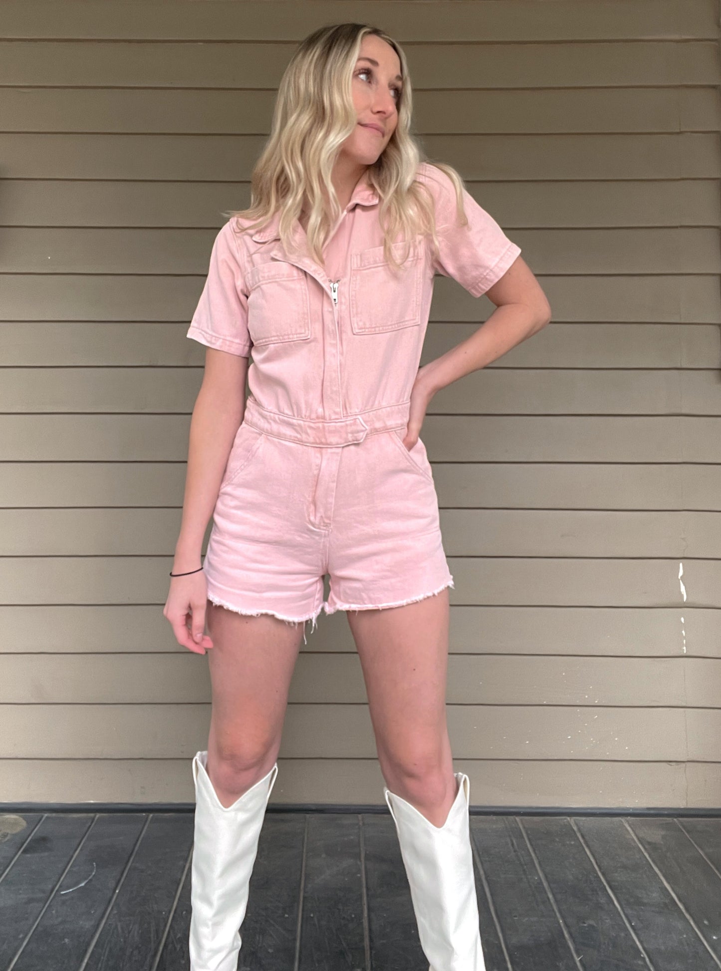 Adventure Denim Romper - Washed Pink Denim Romper Zipper Pockets 100% Cotton Color: Washed Pink Ready for a wild adventure? The Adventurer Denim Romper is the perfect outfit for a daring escapade! The pink and button up design will keep you looking stylish, while the collar adds an air of sophistication - talk about an adventurers dream!