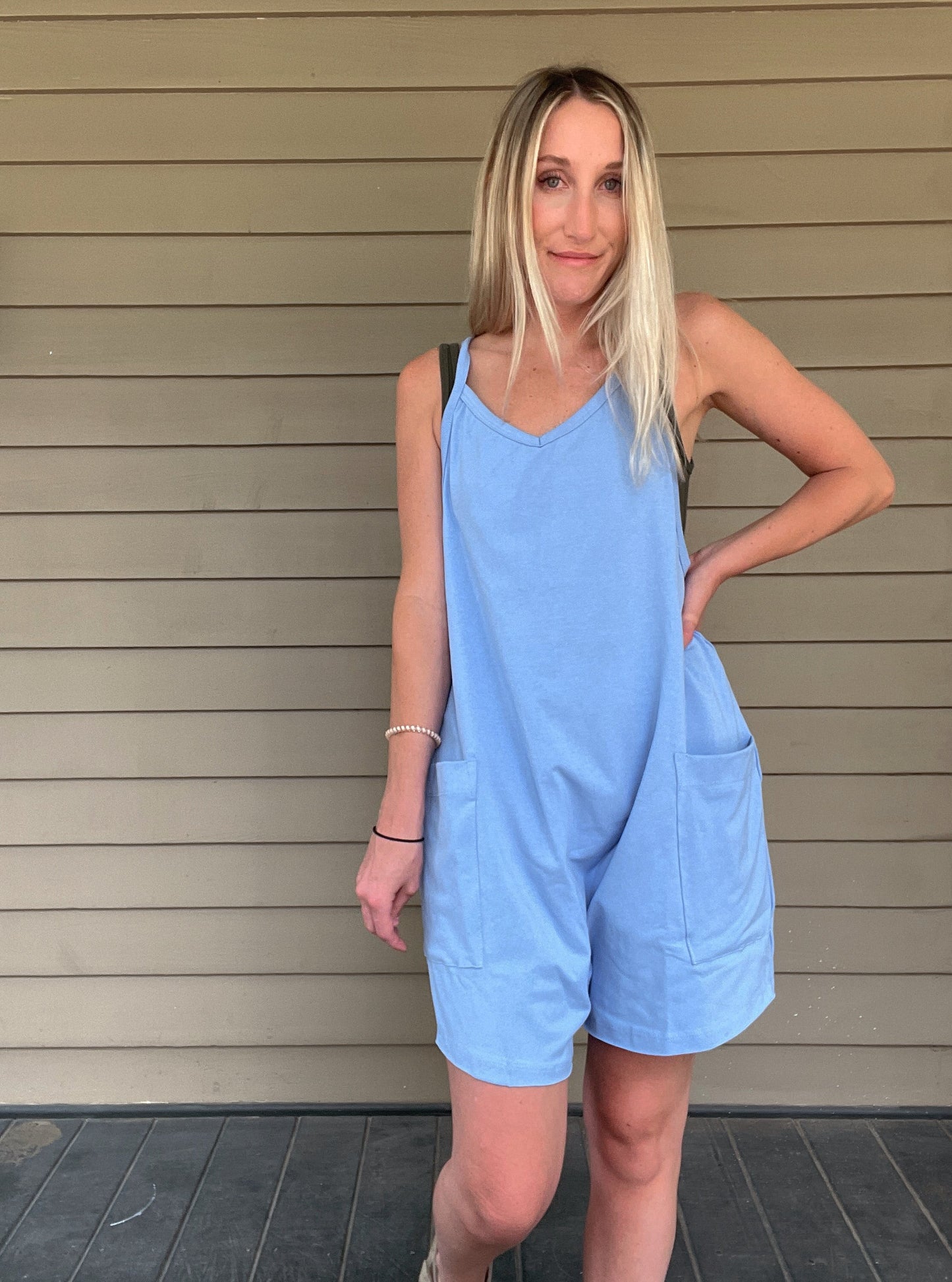 Cozy Up Tank Romper - Blue Oversize Tank V-neck Solid Jersey Romper Effortless and oversized silhouette Racerback Oversized patch pockets Dropped armholes Soft and comfy onesie features a slouchy 95% Cotton, 5% Spandex Color: Blue