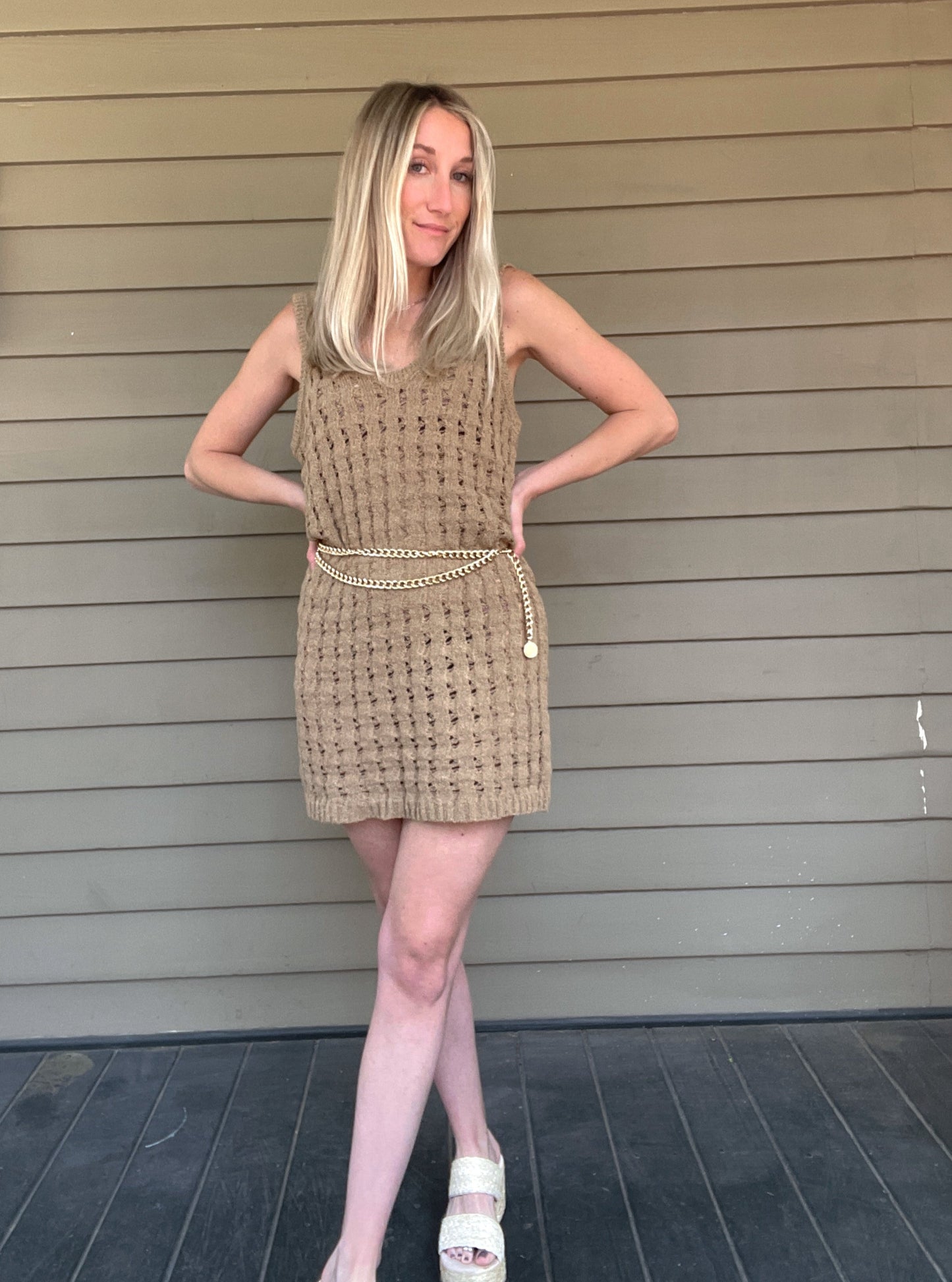 By The Sea Crochet Mini Dress Crochet Knitted Dress 67% Acrylic, 33% Nylon Color: Mocha The By The Sea Crochet Mini Dress is perfect to layer on over your favorite bikini. Crafted with lightweight, breathable crochet, this dress is perfect for hot days in the sun. Effortlessly throw it on for a day in the sand or a night out.