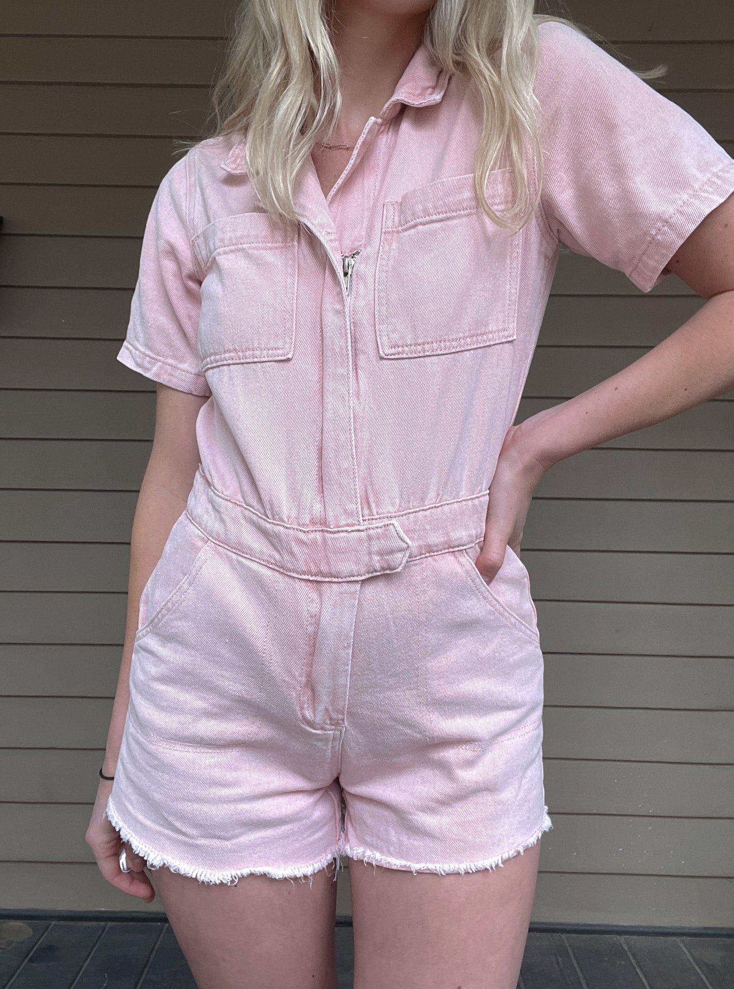 Adventure Denim Romper - Washed Pink Denim Romper Zipper Pockets 100% Cotton Color: Washed Pink Ready for a wild adventure? The Adventurer Denim Romper is the perfect outfit for a daring escapade! The pink and button up design will keep you looking stylish, while the collar adds an air of sophistication - talk about an adventurers dream!