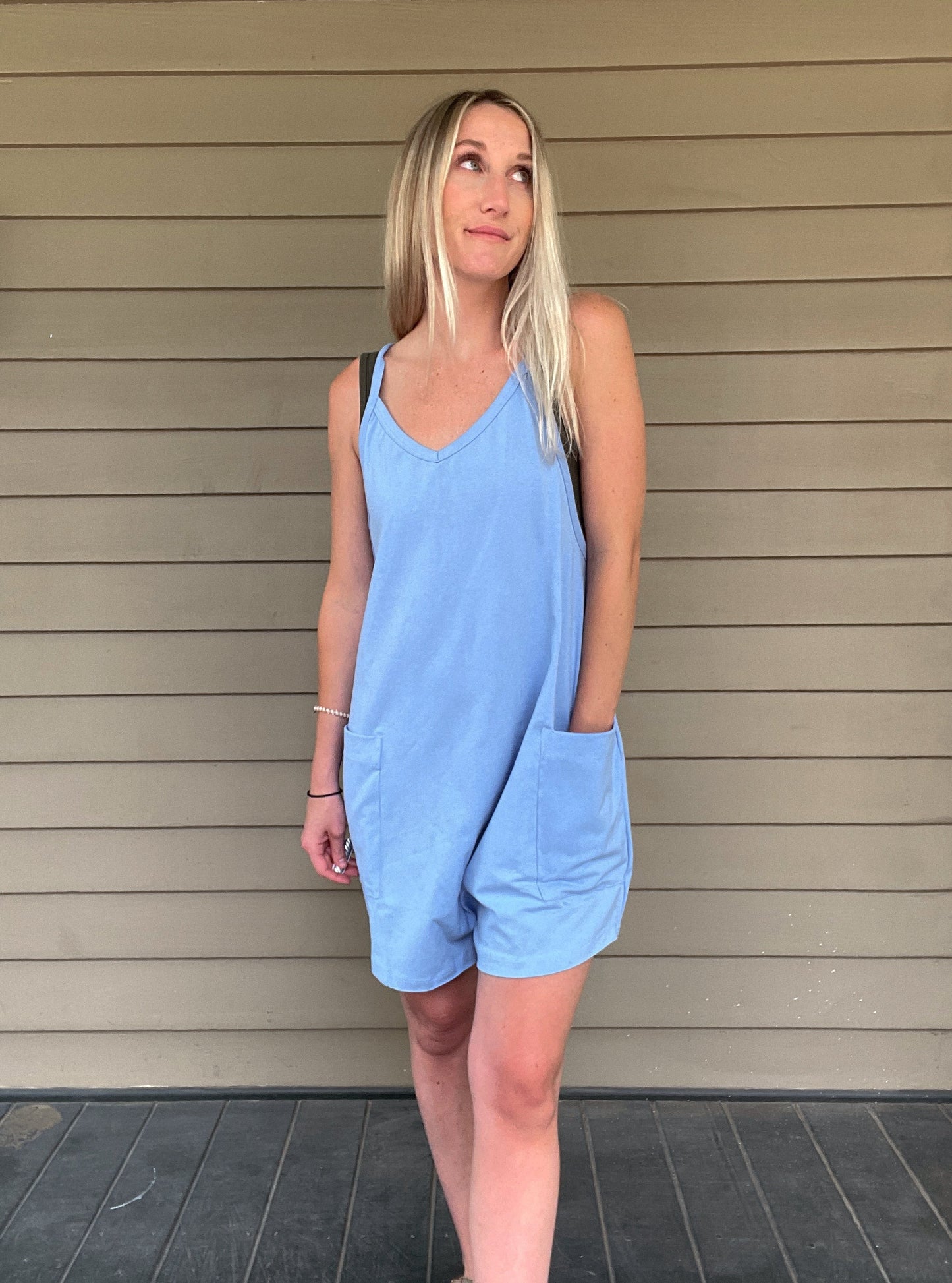 Cozy Up Tank Romper - Blue Oversize Tank V-neck Solid Jersey Romper Effortless and oversized silhouette Racerback Oversized patch pockets Dropped armholes Soft and comfy onesie features a slouchy 95% Cotton, 5% Spandex Color: Blue
