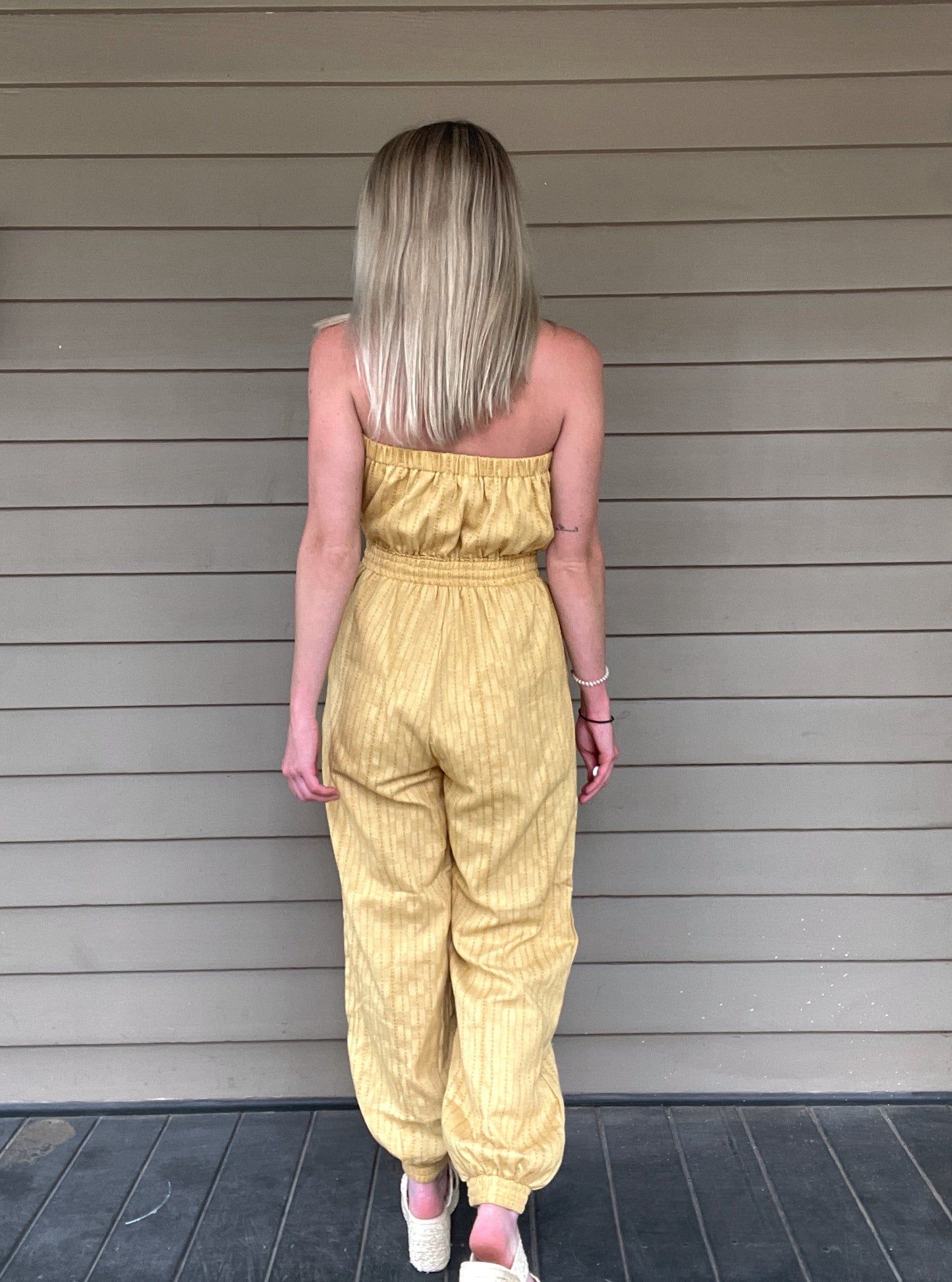 Honey Tube Jumpsuit - Honey Gold Tube Jumpsuit Drawstring elastic waist Pockets 80% Cotton, 10% Linen, 10% Polyester Color: Honey Gold