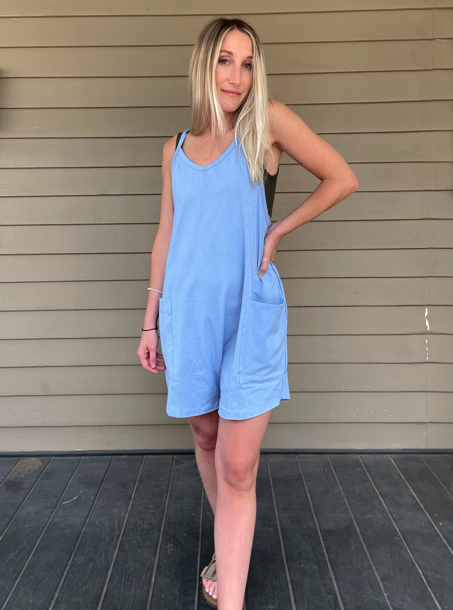 Cozy Up Tank Romper - Blue Oversize Tank V-neck Solid Jersey Romper Effortless and oversized silhouette Racerback Oversized patch pockets Dropped armholes Soft and comfy onesie features a slouchy 95% Cotton, 5% Spandex Color: Blue