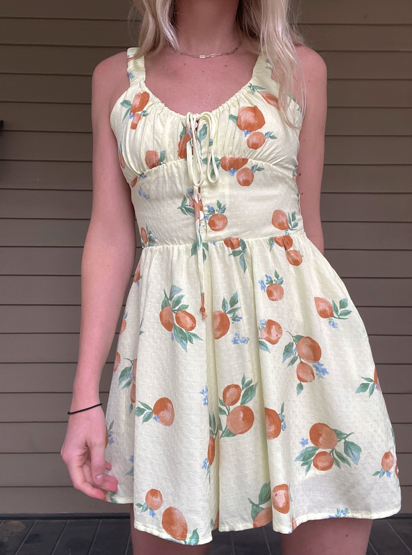 Mimosa Moment Romper - Lemon Wide leg romper with fitted bust detail Collared neck line Pockets 100% Rayon Color: Lemon This bright and vibrant Mimosa Moment Romper is perfect for summer days. Crafted from breathable light fabric, it is sure to keep you cool and comfortable all day long. The bold yellow hue adds a cheerful note to any wardrobe.