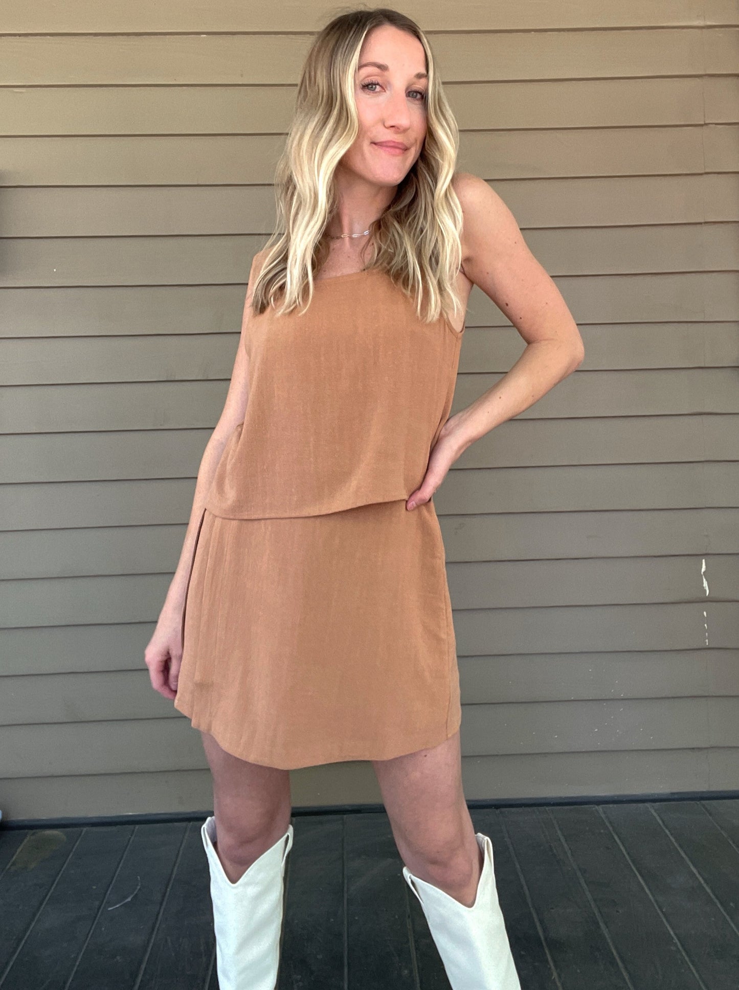 Out West Tank Top and Skirt Set Tank top and skirt set Loose tank top Side button details on skirt Mini skirt 70% Rayon, 30% Linen Color: Tan