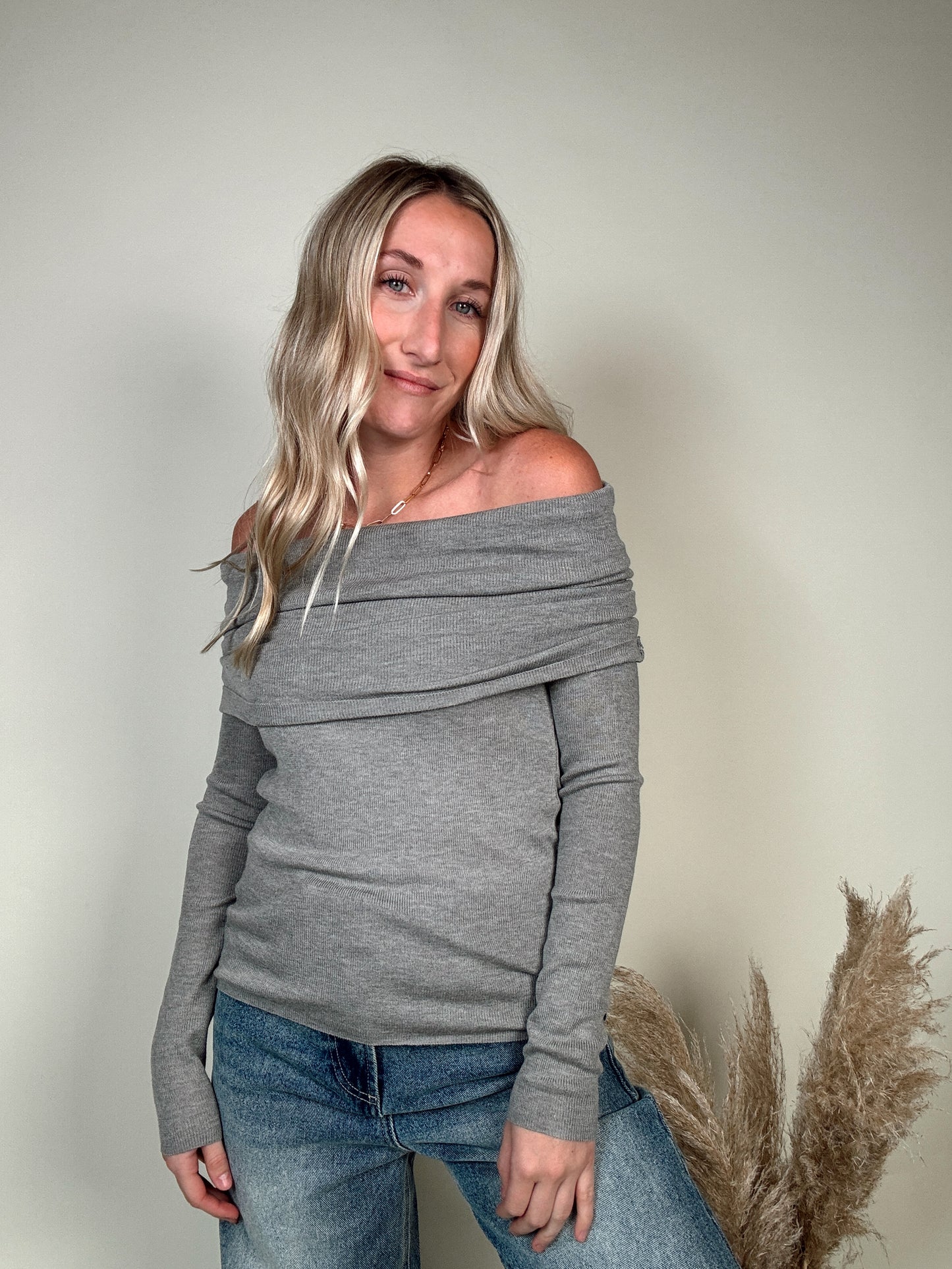 We The Free Iris Layering Top. Your new favorite wardrobe staple from our We The Free collection featured in a soft cotton fabrication and flattering off-the-shoulder style with long-sleeves and exposed seam detailing.