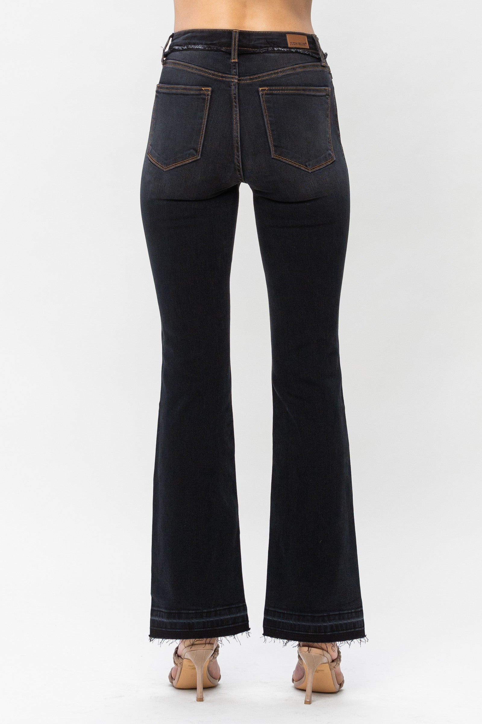 Black High Waist Release Hem Slim Bootcut - Judy Blue  Slim Boot Cut Release Hem High Waist FRONT RISE: 10.63" INSEAM: 32" 65% Cotton, 21%Rayon, 11% Poly, 3% Spandex Color: Black The Black High Waist Release Hem Slim Bootcut by Judy Blue is perfect for a day out. These stylish boot cut jeans feature a modern slim fit, high waist and flattering release hem. Get ready to look your best anytime, anywhere.