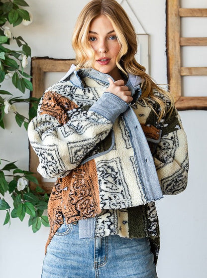 Bandana Print Sherpa Jacket  Relaxed Fit Hooded Pocket Details Bandana Print 100% Polyester Color: Cream Combo This Bandana Print Sherpa Jacket features a timeless design and a warm interior. With an on trend bandana print, this jacket is a stylish way to stay warm in any weather.