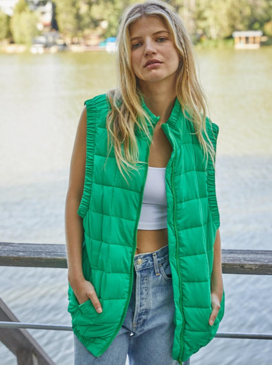 Woven Zipper Down Mock Neck Sleeveless Puffer Vest Jacket Pockets And Arm Detail 100% Nylon Color: Multiple The Edeline Vest is a stylish and comfortable puffer vest, perfect for cold weather. Crafted with a lightweight fill and quilted details, you'll stay warm and cozy all season long. Zip up and face the elements without sacrificing your style.