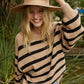 Greta Striped Sweater  Knit Sweater Crew Neck 70% Polyester, 27% Recycled Polyester, 3% Spandex Color: Mocha Stay warm and stylish with the Greta Striped Sweater. Crafted from cozy material, this sweater features bold stripes for a classic look. Perfect for any occasion, the Greta Sweater is sure to become a favorite.