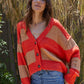  Izzy Striped Cardigan  Knit Sweater Stripe V-Neck Button Down Long Sleeve Cardigan 68% Acrylic, 22% Nylon, 10% Alpaca Color: Coral Mocha The Izzy Striped Cardigan features a classic striped design and a button-up front. This timeless style can be worn for a variety of occasions, from casual to dressy. Made from a soft, comfortable fabric, you get stylish warmth without sacrificing breathability