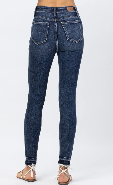 High Waist Tummy Control Skinny Jeans - Judy Blue  Skinny Jeans Release Hem High Waist Tummy Control Panel Size down 1 size FRONT RISE: 10.75" INSEAM: 28.5" 93% Cotton, 6% Polyester, 1% Spandex Color: Blue These High Waist Tummy Control Skinny Jeans from Judy Blue will help you look slimmer and smoother without sacrificing comfort. Crafted with a special tummy control panel, they offer superior support and a flattering fit. With these jeans, you'll feel comfortable while looking your best.