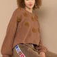 Teddy Floral Fleece Sweater  Designed in round neck Balloon sleeves Relaxed fit Embellished floral patch pattern Berber fleece pullover sweater Specs/dimensions: - Bust: 27-1/2" - Length: 21" - Shoulder: 25-1/2" - Sleeve length: 17" 100% Polyester Color: Mocha