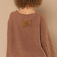 Teddy Floral Fleece Sweater  Designed in round neck Balloon sleeves Relaxed fit Embellished floral patch pattern Berber fleece pullover sweater Specs/dimensions: - Bust: 27-1/2" - Length: 21" - Shoulder: 25-1/2" - Sleeve length: 17" 100% Polyester Color: Mocha