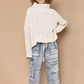 Turtle Neck Cable Knit Sweater Designed in an oversize body Turtle neck long sleeve in chenille with cable knitting Pullover sweater Specs/dimensions: - Bust: 30" - Length: 20-1/2" - Sleeve: 17-1/2" - Shoulder: 29-1/2" 100% Polyester Color: Powder Cream