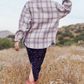 Lilly Lilac Plaid Shacket  Plaid Design Button Down Shacket Collar 100% Polyester Color: Lilac This Lilly Lilac Plaid Shacket is a fashionable option for the cooler seasons. Combining the warmth of a jacket and the versatility of a shirt, it is an ideal addition to any wardrobe. Crafted from plaid fabric, this shacket provides a stylish and cozy look.