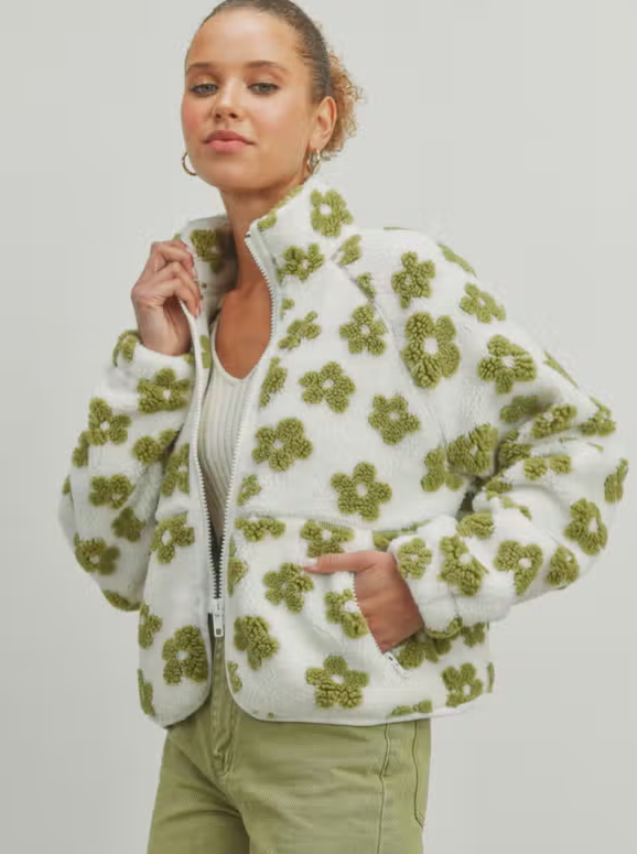 Daisy Flower Fleece Jacket  Zip up jacket Fleece Floral pattern Pockets 100% Polyester Color: Multiple Daisy Flower Pattern Fleece Sherpa - a delightful blend of charm and comfort. This fleece sherpa showcases a cheerful daisy flower pattern, enveloping you in warmth and style.
