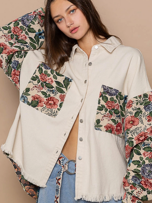 Stay stylish and warm in this Garden Raglan Button Down Jacket. This button down shacket has stylish floral details that keep you cozy while looking fashionable. Perfect for cool-weather days.