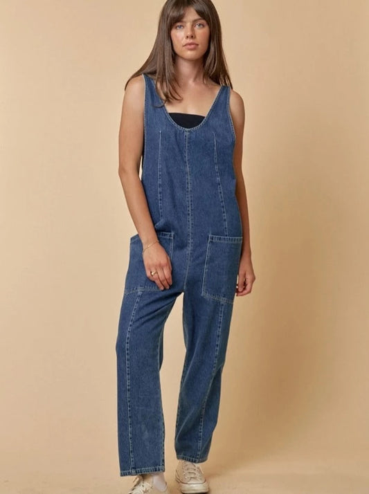 Denim Days Sleeveless Jumpsuit   Denim jumpsuit Scoop neckline Sleeveless 90% Cotton, 10% Polyester Color: Denim This Denim Days Sleeveless Jumpsuit is perfect for any occasion. Crafted from lightweight denim, it features a sleek, sleeveless design for a contemporary look. Its relaxed fit and added pockets make it comfortable and practical all-day long.