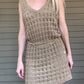 By The Sea Crochet Mini Dress  Crochet Knitted Dress 67% Acrylic, 33% Nylon Color: Mocha The By The Sea Crochet Mini Dress is perfect to layer on over your favorite bikini. Crafted with lightweight, breathable crochet, this dress is perfect for hot days in the sun. Effortlessly throw it on for a day in the sand or a night out.