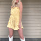 Miss Sunshine Linen Tube Romper - Melon  Strapless tube style romper Draw string waist  Ruffle detail Pockets 53% Viscose, 47% Cotton Color: Melon Look your best in this Miss Sunshine Linen Tube Romper. Crafted from light and airy linen, this strapless romper will keep you cool in the summer heat. Its mellow melon color adds an extra touch of brightness to your look.