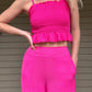 Blossoming Two Piece Set - Fuchsia  Matching Top and Bottom Set Elastic Waist  Smocked top 95% Rayon, 5% Nylon Color: Fuchsia This stylish yet comfortable two piece set is perfect for any occasion. The fuchsia colored fabric is luxuriously soft and breathable, allowing you to feel great all day long. The matching set is a timeless classic that will make you look stylish in any setting.