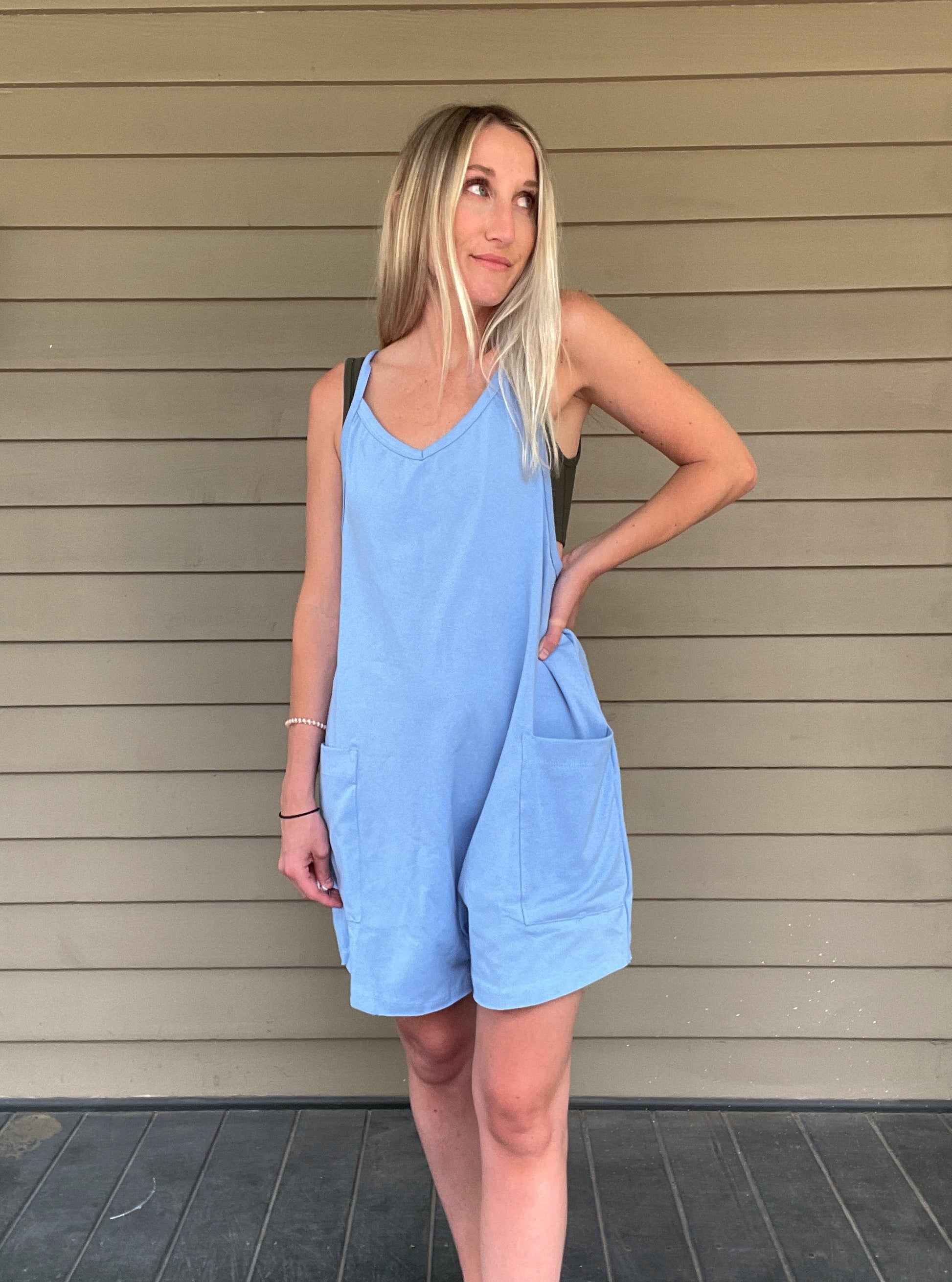 Cozy Up Tank Romper - Blue  Oversize Tank V-neck Solid Jersey Romper Effortless and oversized silhouette Racerback Oversized patch pockets Dropped armholes Soft and comfy onesie features a slouchy 95% Cotton, 5% Spandex Color: Blue