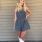 Western Washed Denim Romper  Denim Romper Zipper Pockets 100% Cotton String detailed back Color: Washed Denim This Western Washed Denim Romper will have you feeling stylish and comfortable. Made of premium denim, it provides a snug fit and is designed for easy movement. Enjoy taking on the day in this fashionable romper.