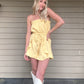 Miss Sunshine Linen Tube Romper - Melon  Strapless tube style romper Draw string waist  Ruffle detail Pockets 53% Viscose, 47% Cotton Color: Melon Look your best in this Miss Sunshine Linen Tube Romper. Crafted from light and airy linen, this strapless romper will keep you cool in the summer heat. Its mellow melon color adds an extra touch of brightness to your look.